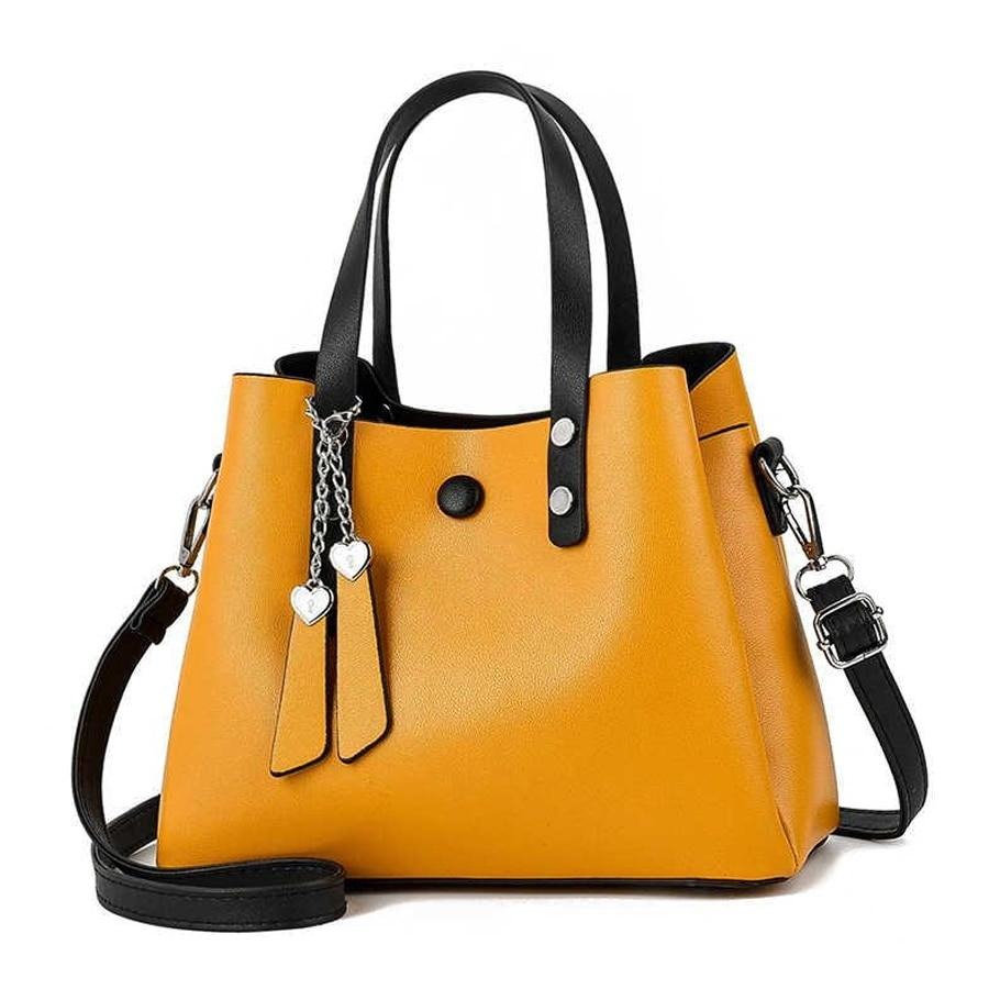 HEART TASSEL DETAILED YELLOW HANDBAG