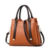 SOLID BROWN DARKER HANGER DETAILED HANDBAG