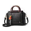 TOP HANDLE DETAILED HANDBAG