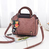 TOP HANDLE DETAILED HANDBAG