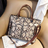 BROWN SNAKE SKIN PATTERNED HANDBAG