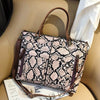 BROWN SNAKE SKIN PATTERNED HANDBAG