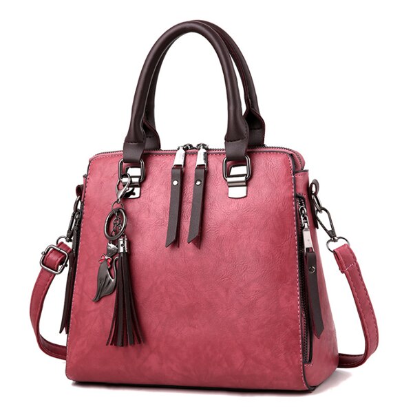 CAT TASSEL DETAILED BROWN LEATHER HANDBAG