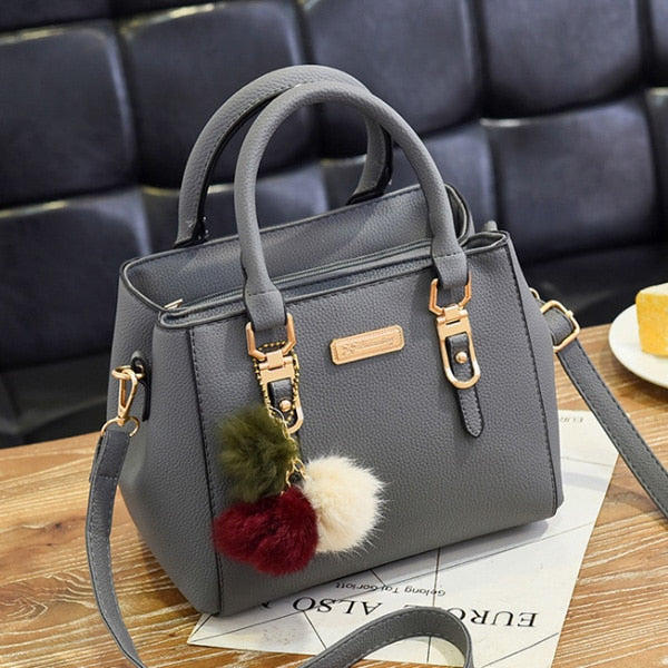 FLUFFY TASSEL DETAILED HIGH CAPACITY HANDBAG