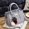 FLUFFY TASSEL DETAILED HIGH CAPACITY HANDBAG