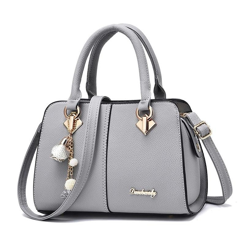 SOLID COLOR WHITE TASSEL DETAILED HANDBAG