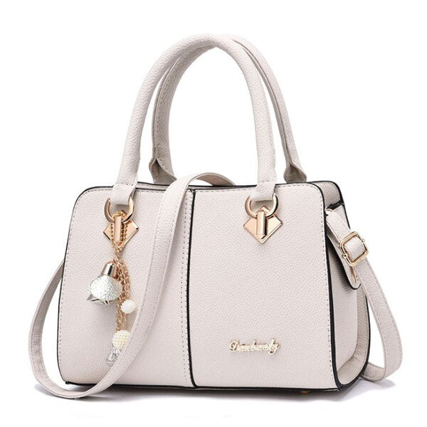 SOLID COLOR WHITE TASSEL DETAILED HANDBAG