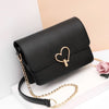 HEART SHAPED BUTTON DETAILED SHOULDER BAG