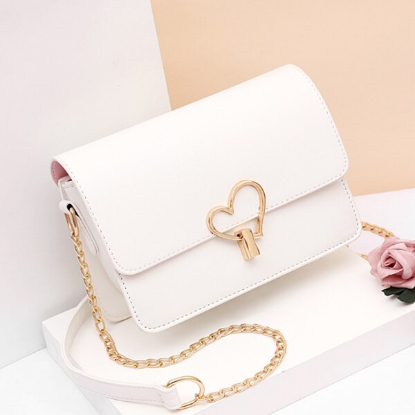 HEART SHAPED BUTTON DETAILED SHOULDER BAG