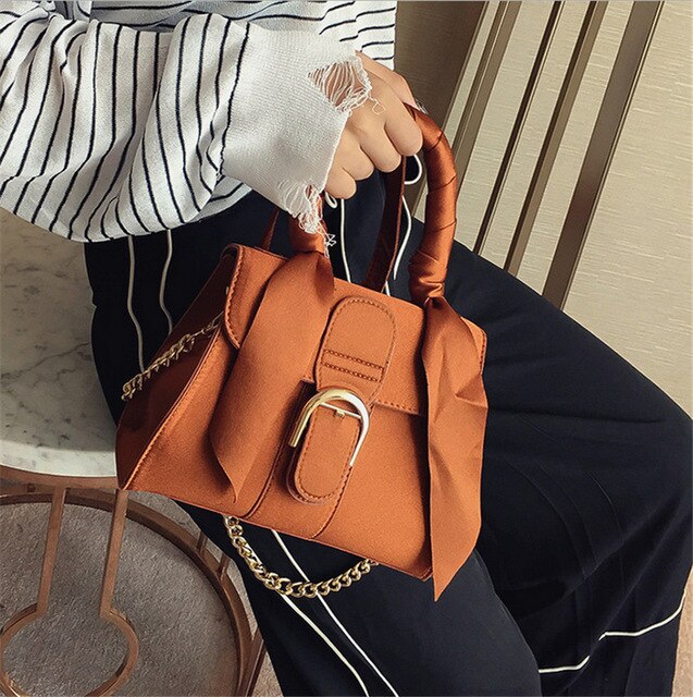 TURQUISE BOW DETAILED MINI HANDBAG